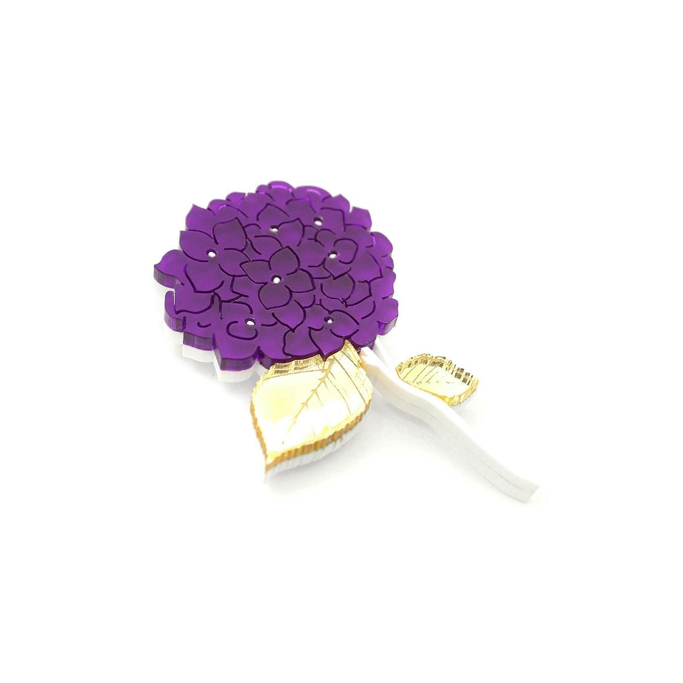purple brooch