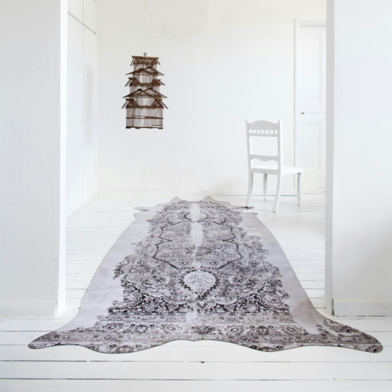 Super Long Persian Faux Cowhide Rug In Grey By Mineheart Fy Super Long Persian Faux Cowhide Rug In