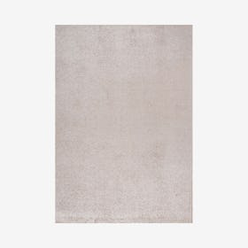 Haze Solid Low-Pile Area Rug - Beige