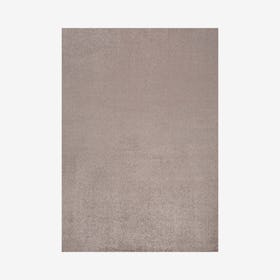 Haze Solid Low-Pile Area Rug - Brown