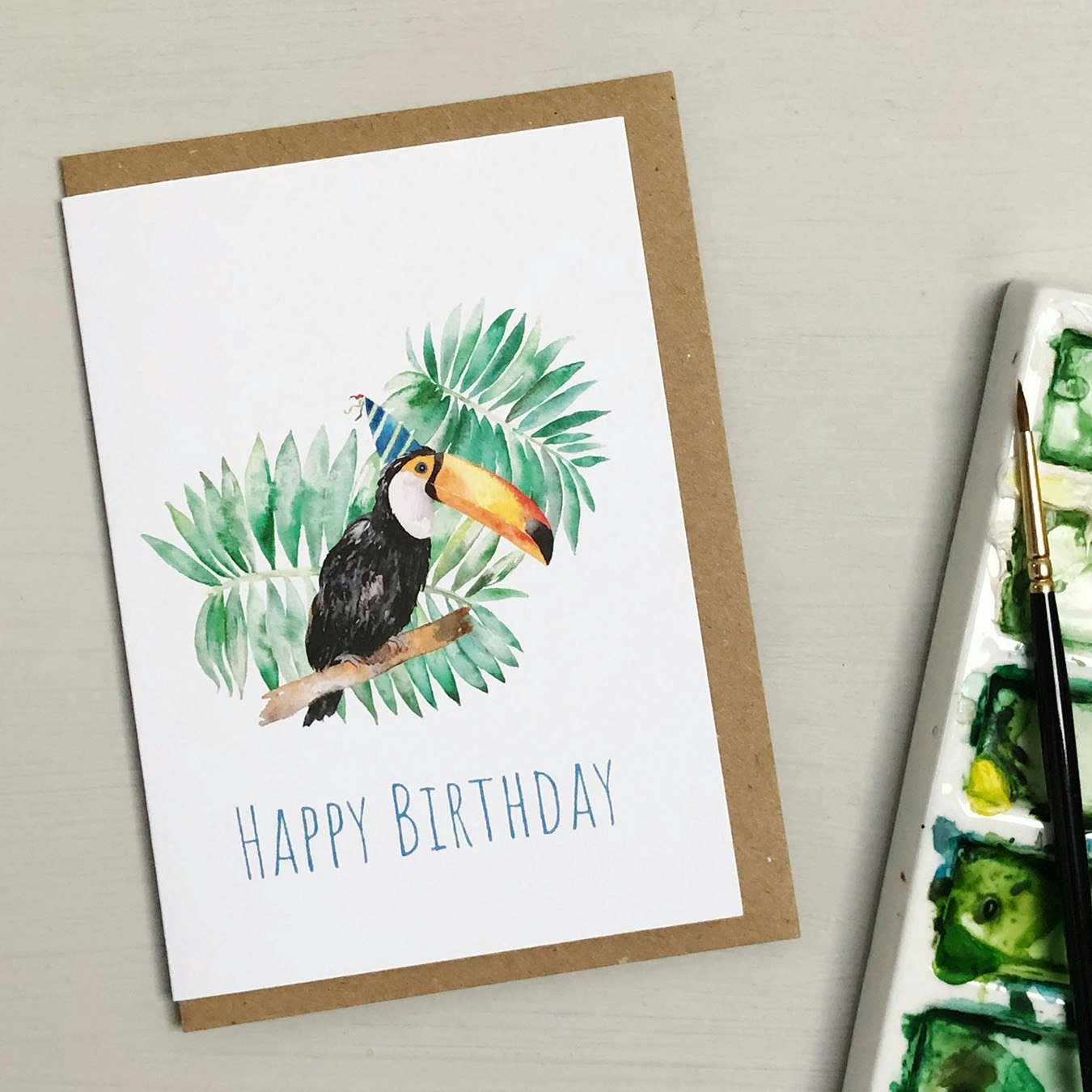 Party Toucan Greeting Card by Katie Hipwell