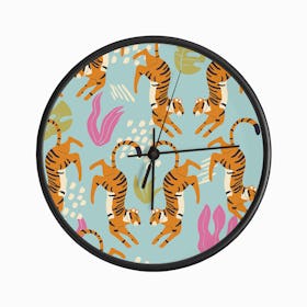 Prancing Tiger Pattern On Blue With Tropical Leaves Clock