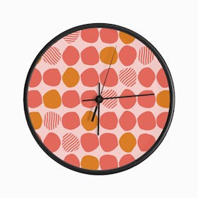 Orange And Pink Polka Dot Pattern On Light Pink Background Clock