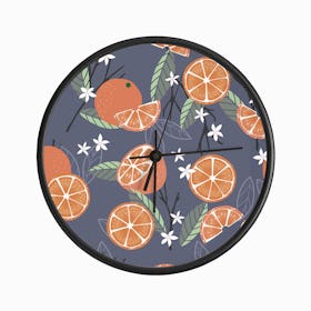 Orange Pattern With Florals And Branches On Purple Clock