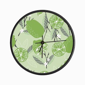 Lime Pattern With Floral Decoration On Pastel Green Clock