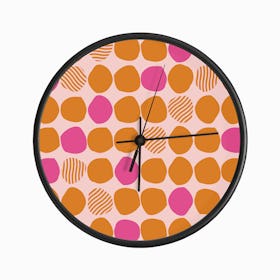 Vibrant Orange And Pink Polka Dot Pattern Clock