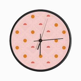 Geometric Pattern With Bright Orange Sunshine On Light Pink Clock