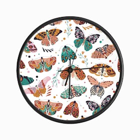 Colorful Hand Drawn Moths And Butterflies Pattern With Florals On White Clock