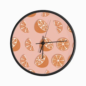 Orange Pattern On Pink Clock