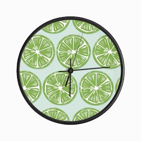 Lime Slices Pattern On Pastel Blue Clock