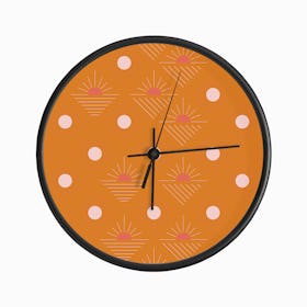 Geometric Pattern With Pink Sunshine On Bright Orange Clock