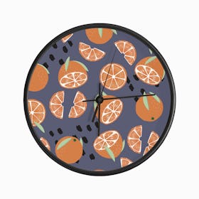 Orange Pattern On Purple With Floral Decoration Clock