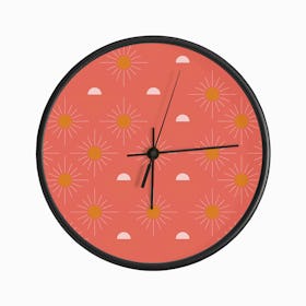 Geometric Pattern With Light Pink And Orange Sunshine On Vibrant Red Clock