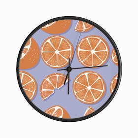 Orange And Orange Slices Pattern On Pastel Purple Clock