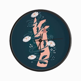 Elegant Hand Surrounded With Flowers On Deep Blue Clock