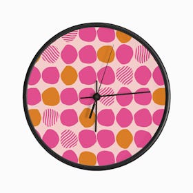 Bright Pink And Orange Polka Dot Pattern On Light Pink Background Clock