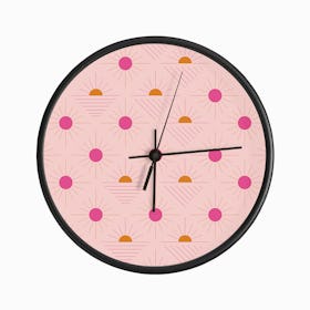 Geometric Pattern With Bright Pink And Orange Sunshine On Light Pink Clock