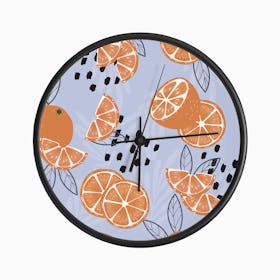 Orange Pattern On Pale Purple Clock