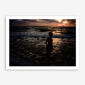 Young Boy Looking At The Sunset Art Print