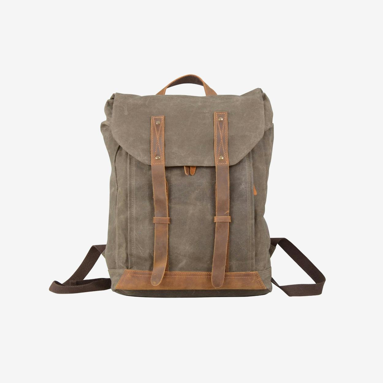 green canvas backpack with leather straps