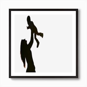 Silhouette Of A Woman Holding A Child Art Print