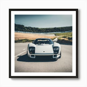 White Sports Car Driving Down A Road Art Print