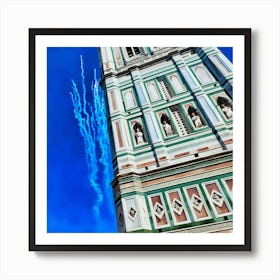 Giotto's Campanile in Florence. The image showcases Giotto's Campanile, a free-standing bell tower that is part of the complex of buildings that make up Florence Cathedral in Florence, Italy. The tower is renowned for its intricate Gothic architecture, featuring colorful marble panels in green, pink, and white, and adorned with statues and decorative elements. The clear blue sky provides a striking contrast to the detailed facade of the tower. 2 Art Print