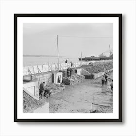 Piling Sandbags Along The Levee During The Height Of The Flood, Cairo, Illinois By Russell Lee Art Print