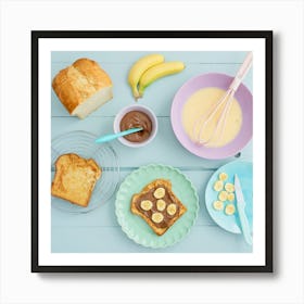 Breakfast with French toast with chocolate spread and banana shot from above Art Print