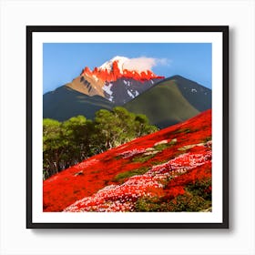 A Large Mountain With Red Flowers Stacked Below It And A Wide Blue Sky Behind (1) Art Print