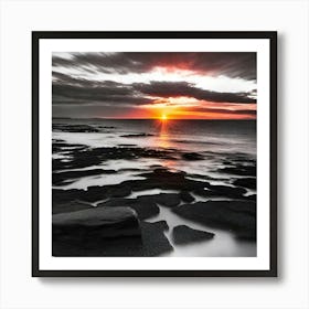 Sunset Over A Rocky Shore Art Print