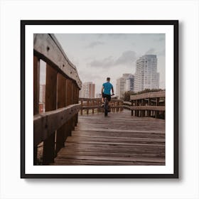 Man Riding Bike On Wooden Boardwalk Art Print