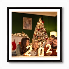 Family In Front Of A Christmas Tree Art Print