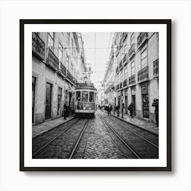 Black And White Photo Lisbons Vintage Tramway Weaving Through Narrow Historic City Streets Tram D Art Print