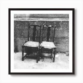 Two Chairs Against A Wall Art Print