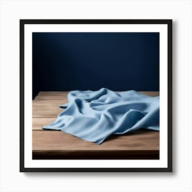 Blue Cloth On A Wooden Table Art Print