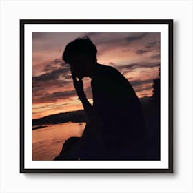 Silhouette Of A Man At Sunset Art Print