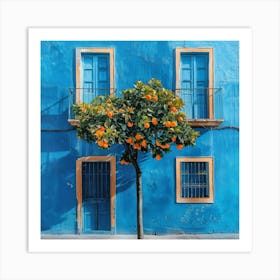 Orange Tree In Front Of Blue House Art Print