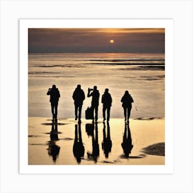 Silhouettes Of People On The Beach Art Print