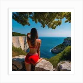 Woman In A Red Bikini Sitting On A Cliff Art Print