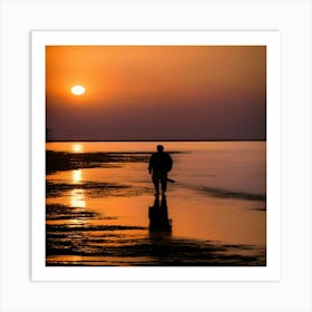 Silhouette Of Man Walking On Beach At Sunset Art Print