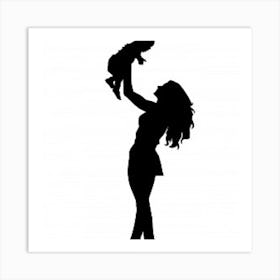 Silhouette Of A Woman Holding A Baby Art Print