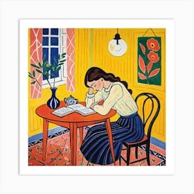 Reading At The Table Art Print