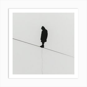 Silhouette Of A Man On A Wire Art Print