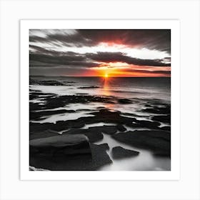 Sunset Over A Rocky Shore Art Print