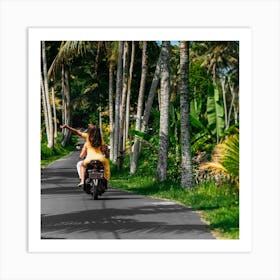 Couple Riding A Motorcycle Down A Road Art Print