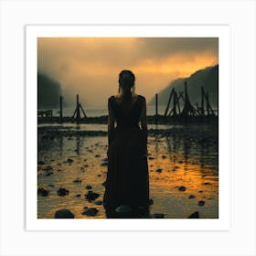 Woman Standing In Water At Sunset Art Print