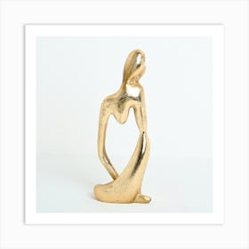 Gold Sculpture Of A Woman Art Print