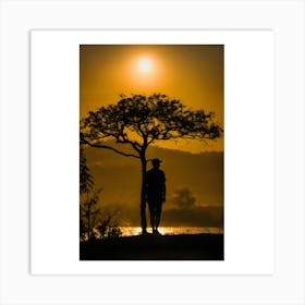 Silhouette Of A Man At Sunset Art Print