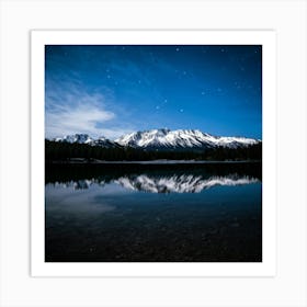 Snow Capped Mountains Rising Majestically From A Tranquil Reflection Mirror Lake In The Foreground Art Print